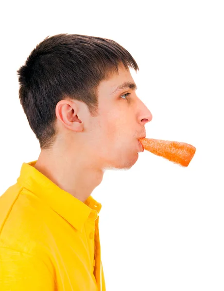 Young Man with a Carrot — Stock Photo, Image