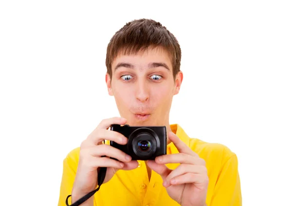 一个拿着照相机的年轻人 — 图库照片