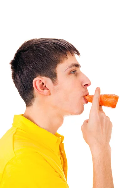 Young Man with a Carrot — Stock Photo, Image