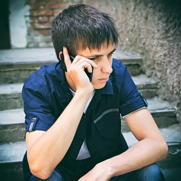 Sad Young Man with Cellphone — Stock Photo, Image