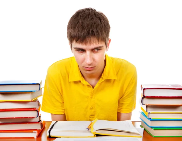 Étudiant ennuyé avec les livres — Photo