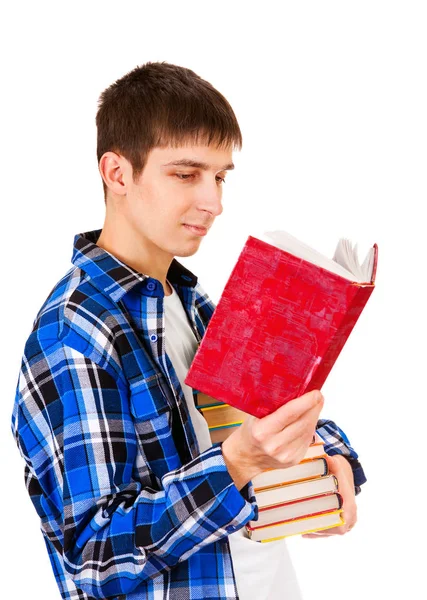 Молодой человек с книгами — стоковое фото
