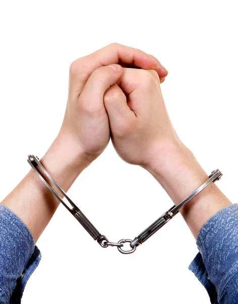 Handcuffs on a Hands — Stock Photo, Image