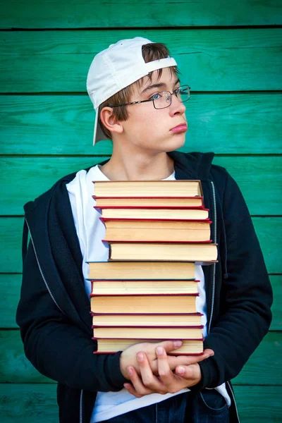 Triste adolescente con libros — Foto de Stock