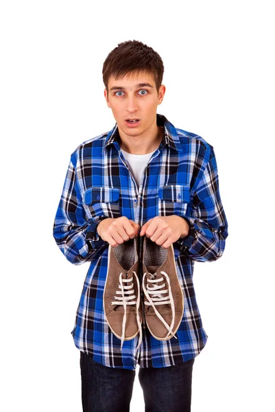 Hombre joven con zapatillas — Foto de Stock