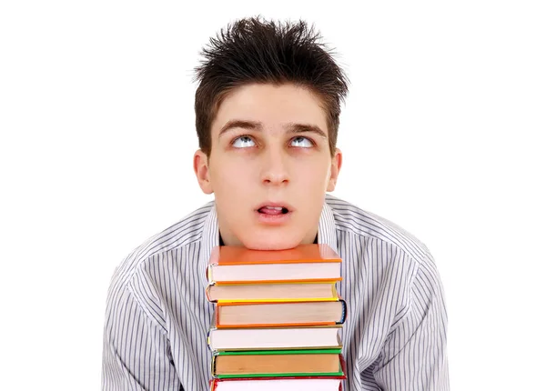 Trött tonåring med en böcker — Stockfoto