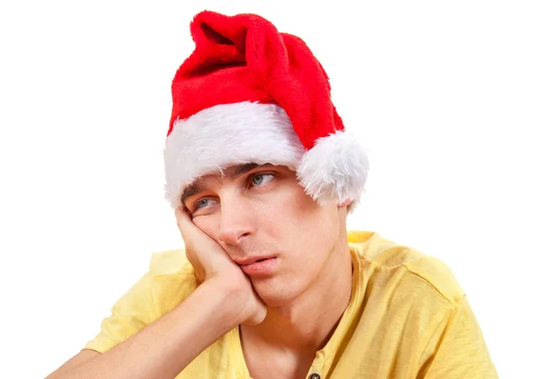 Jovem triste em Santa Hat — Fotografia de Stock