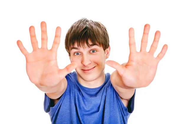 Mladý muž ukazují dlaních — Stock fotografie