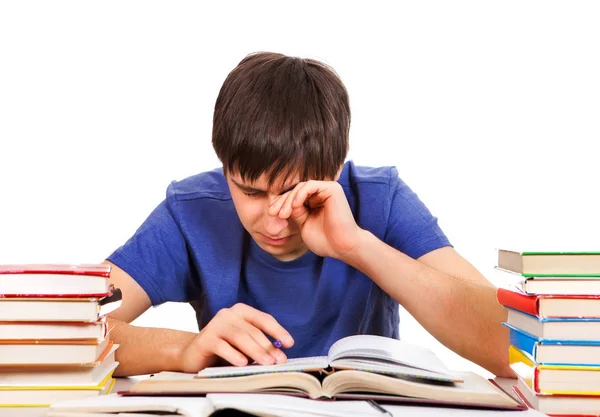 Estudiante cansado con un libro — Foto de Stock
