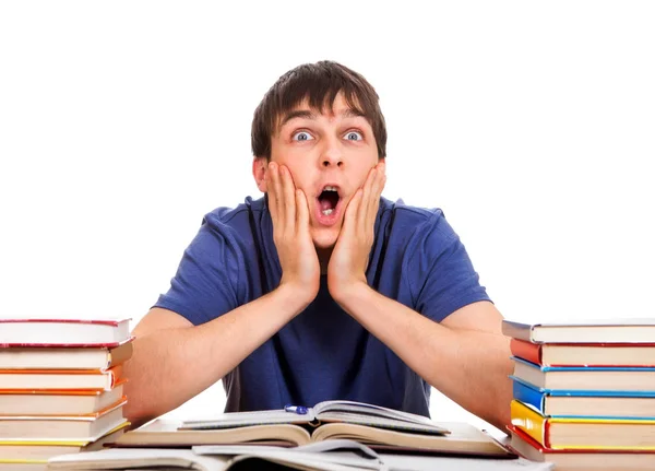 Estudante surpreso com um livro — Fotografia de Stock
