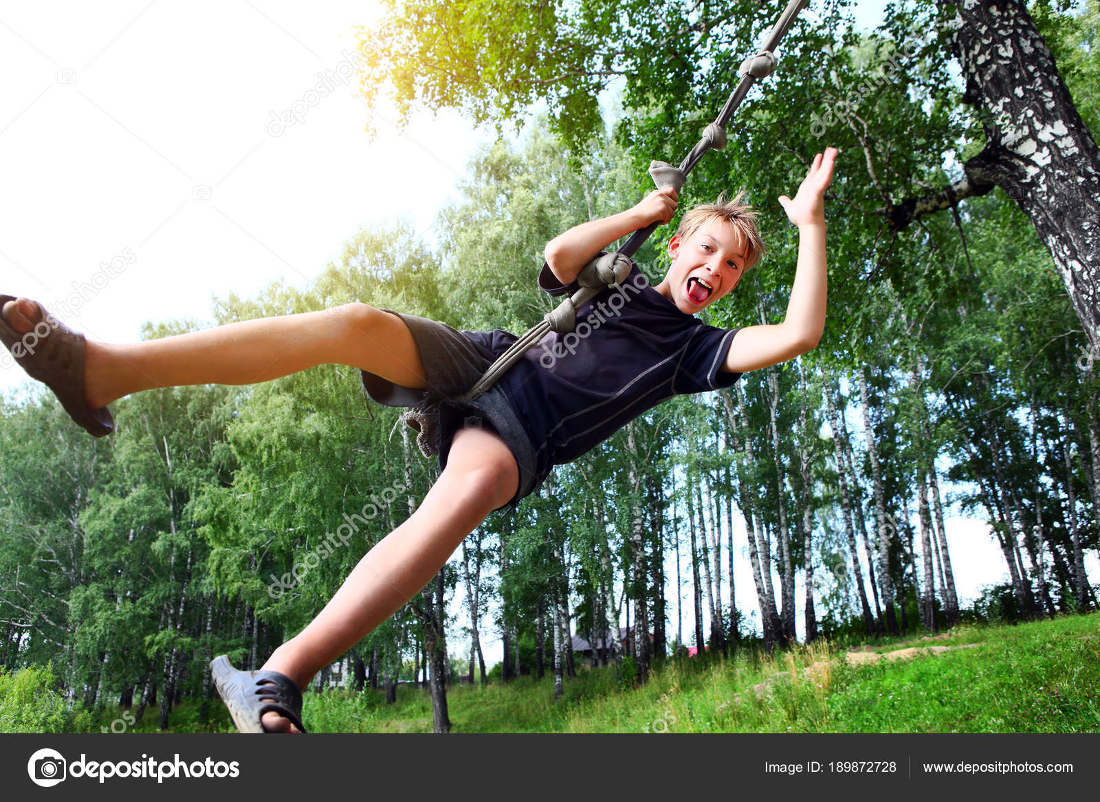 kid-bungee-jumping-stock-photo-sabphoto-189872728