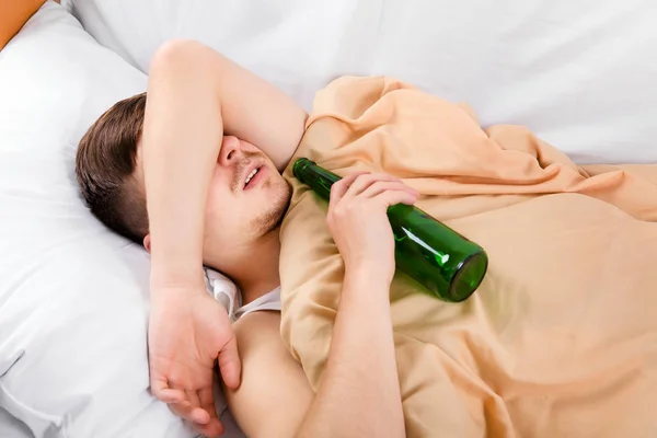 Young Man sleep with a Beer — Stock Photo, Image