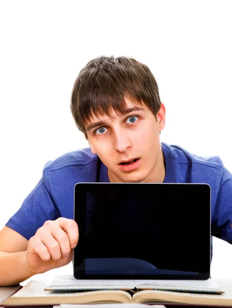 Homem jovem mostrar uma tabuleta — Fotografia de Stock