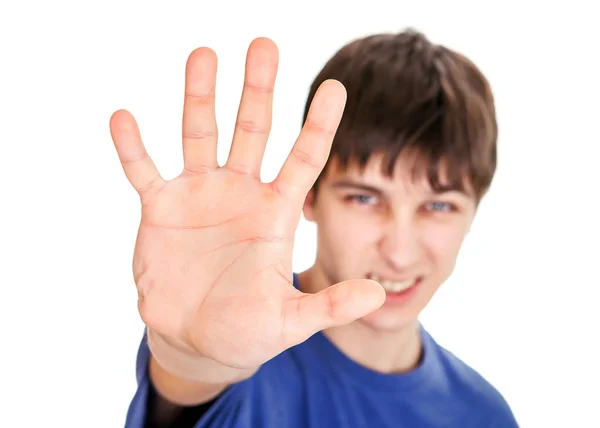 Junger Mann zeigt seine Handfläche — Stockfoto