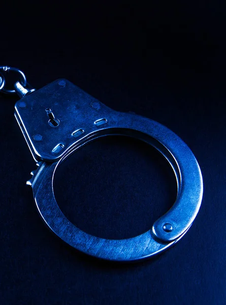 Handcuffs Dark Background Closeup — Stock Photo, Image