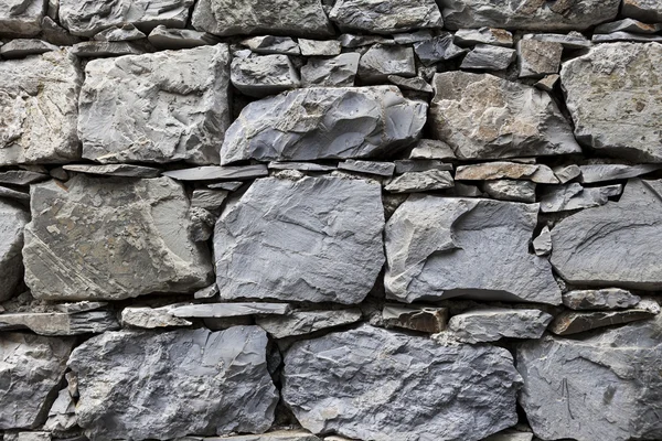 An old stone wall gray large stones — Stock Photo, Image
