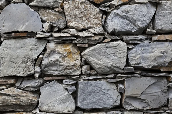 An old stone wall gray large stones — Stock Photo, Image