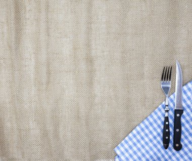 Tuval masa örtüsü, çatal, bıçak biftek ve peçete. Bir et lokantasında için bir menü oluşturmak için kullanılır. Menüsünün arka planı