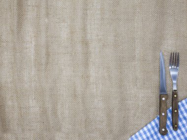 Tuval masa örtüsü, çatal, bıçak biftek ve peçete. Bir et lokantasında için bir menü oluşturmak için kullanılır. Menüsünün arka planı