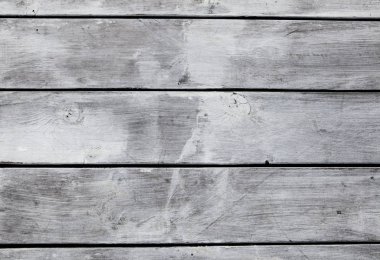 Gri tahtaların ahşap arka planı. Ahşap deseninin güzel dokusu. Kaplama döşeme, duvar kağıdı, mobilya, mobilya cephesi üretimi için harika bir arka plan.