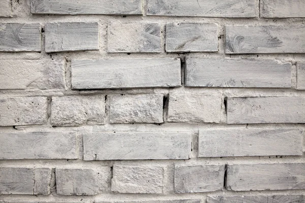 Brick wall, old brick. Pattern of the structure of a brick wall with masonry. Old wall European home — Stock Photo, Image