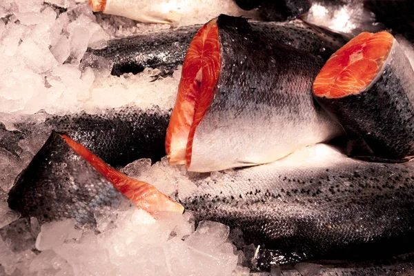 Salmon fillets. Fresh Steaks from salmon., trout, on the market on ice. — Stock Photo, Image