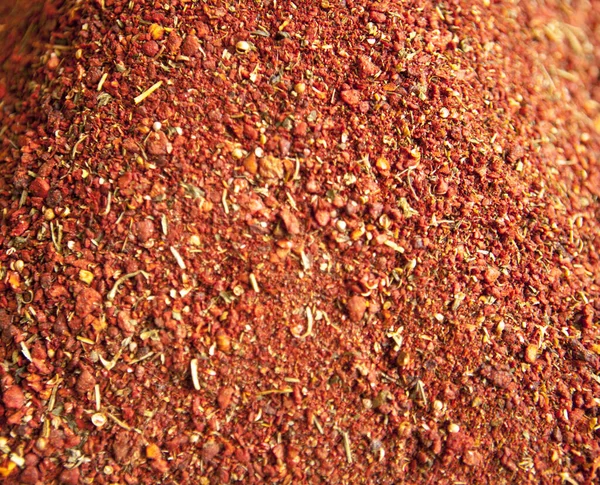 地上の赤唐辛子の種 料理の味付け — ストック写真