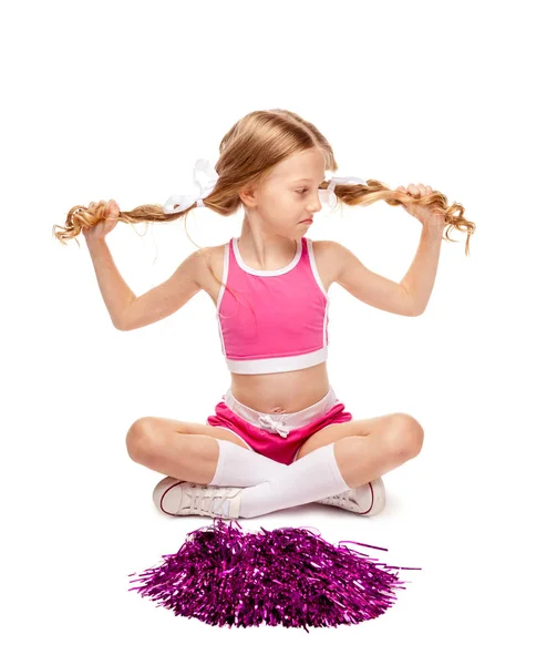 Engraçado cheerleader menina olha para longe em surpresa — Fotografia de Stock