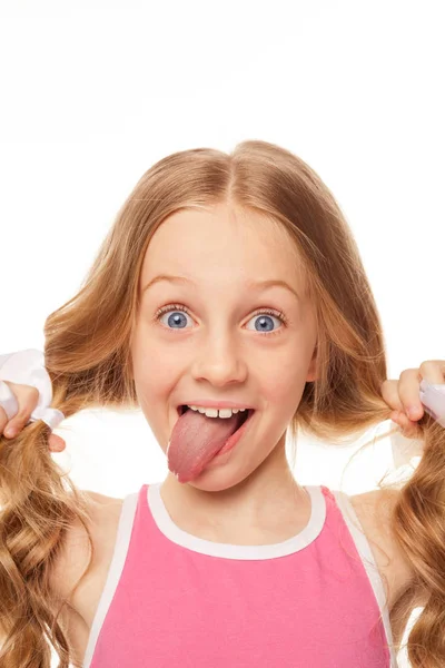 Funny girl makes funny faces and smiles. Photo with a white back — Stock Photo, Image