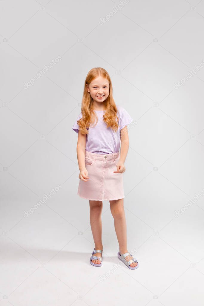 red-haired long-haired girl in daily clothes (skirt, t-shirt)