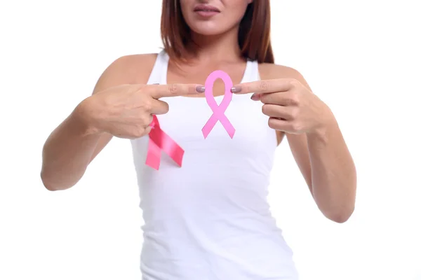 Mujeres mano sosteniendo rosa cáncer de mama conciencia cinta — Foto de Stock