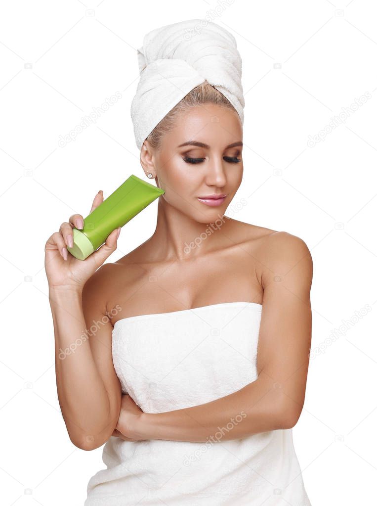 Beauty concept. Caucasian pretty woman with perfect skin holding cosmetic bottle.