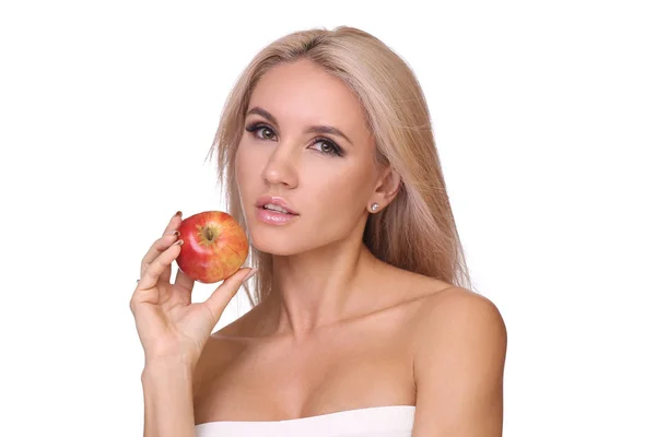 Mujer rubia comer manzana roja —  Fotos de Stock