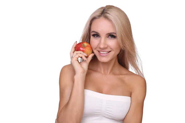 Blond woman eat red apple — Stock Photo, Image