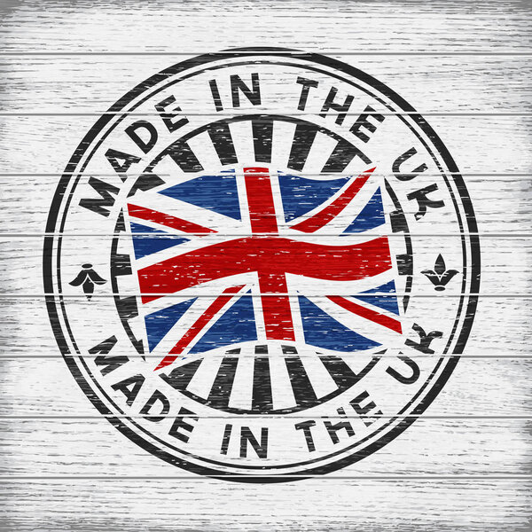 Made in the UK. Stamp on wooden background