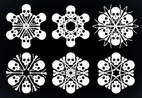 头骨和骨头的快乐 snowlakes — 图库矢量图片