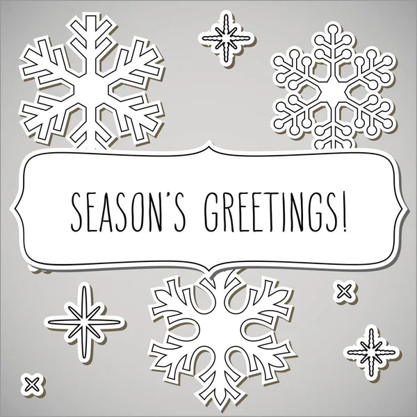 Paper snowflakes frame and Season's greetings — Stock Vector