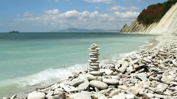 Stack of zen stones on the beach — Stock Video