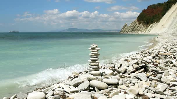 zásobník zen kameny na pláži