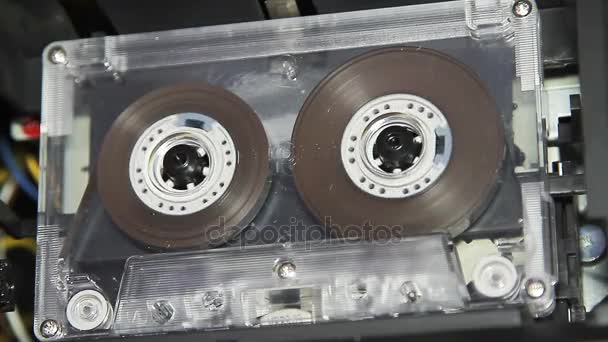 Vintage audio cassette tape with a blank white label — Stock Video