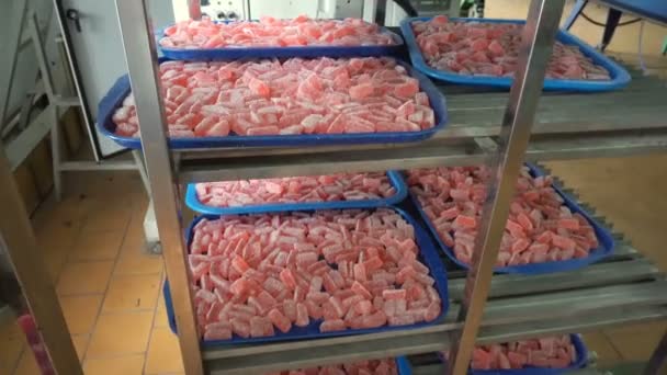 Racks with trays of marmalade in the old factory — Stock Video