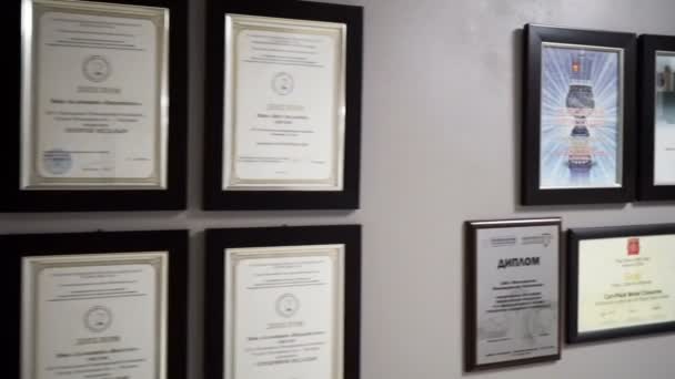 Moscow Russian Federation March 2017 Diplomas Awards Framework Hang Wall — Stock Video