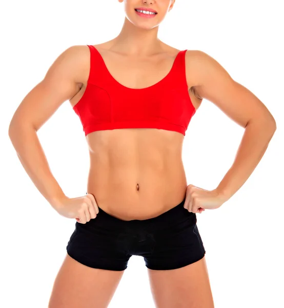 Fitness donna posa su uno sfondo bianco — Foto Stock