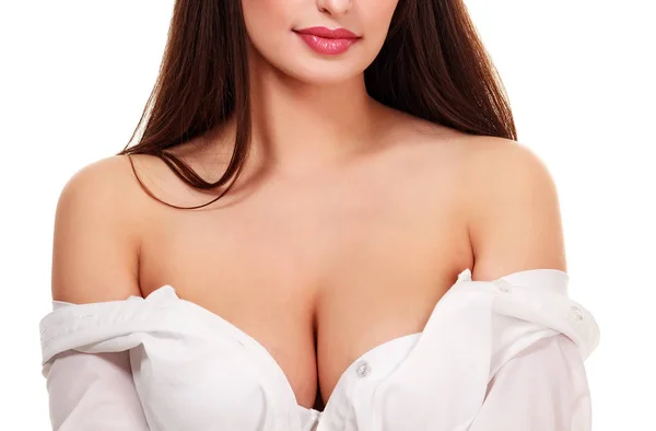 Sexy woman with big boobs is about to undress — Stock Photo, Image