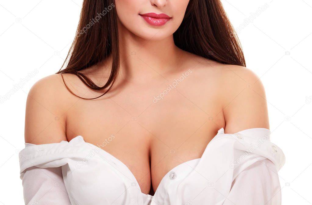 Sexy woman with big boobs is about to undress