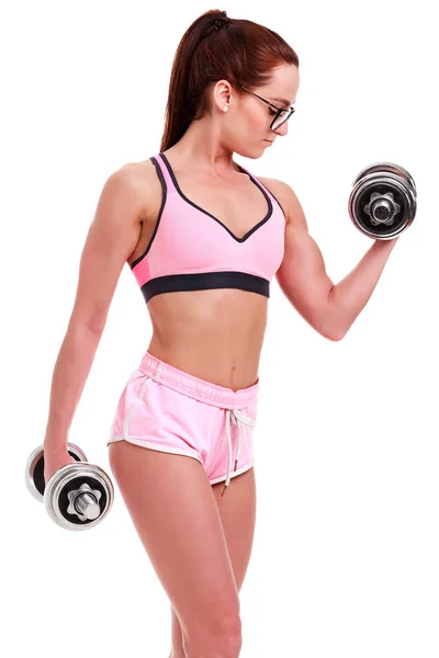 Zeki Kız bardaklarda açık beyaz arka plan üzerinde izole dumbbells ile — Stok fotoğraf