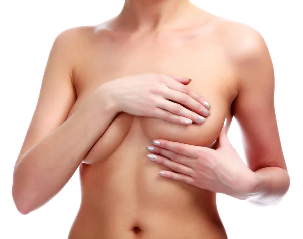 Mujer contrellando mama para cáncer, aislada sobre fondo blanco. Concepto de salud mujer — Foto de Stock