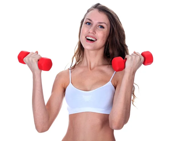 Happy fit woman with red dumbbells, isolated on white background — Stock Photo, Image