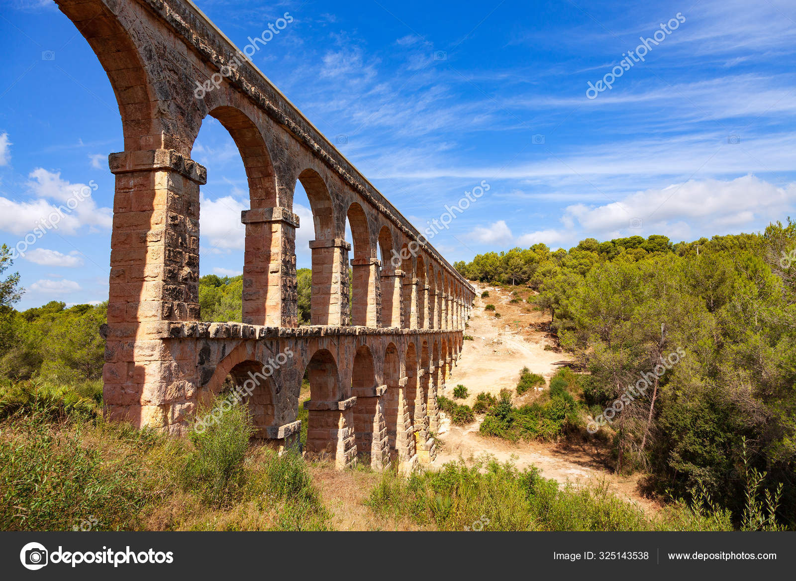 Famous aqueduct in Tarragona, Spain Stock Photo by ©Nobilior 325143538