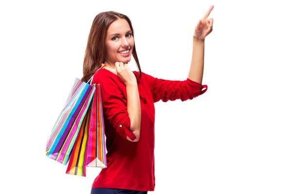 Retrato de joven feliz sonriente bonita mujer con bolsas de compras, aislado sobre fondo blanco —  Fotos de Stock